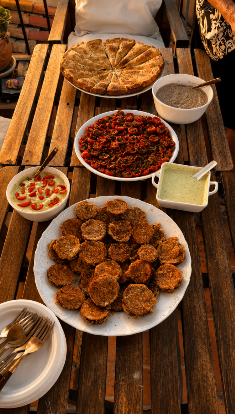Rooftop snacks and small dishes on a wooden table